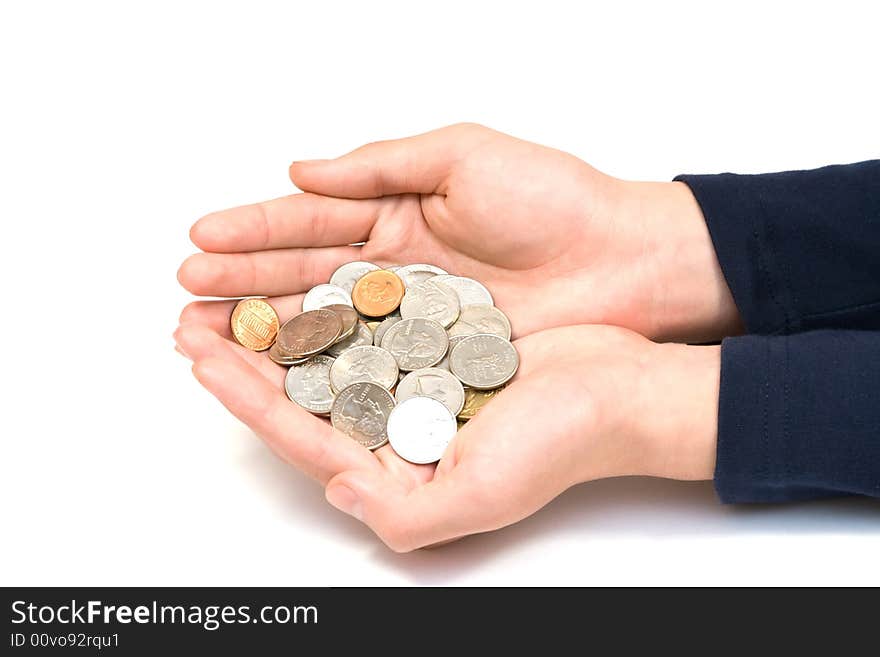 Coins in hand on white background