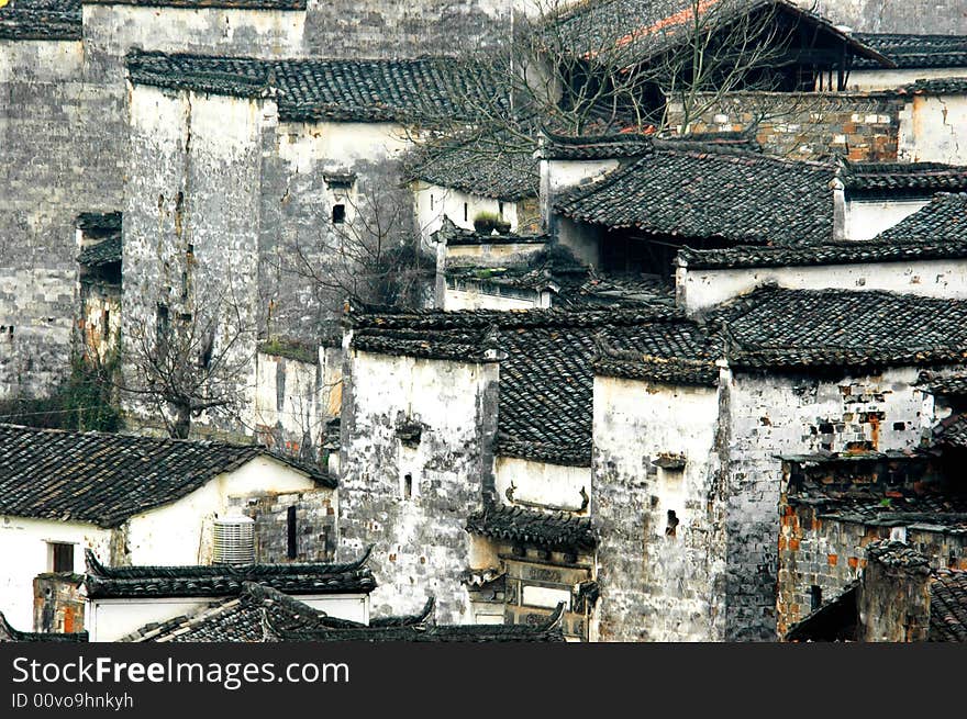 An ancient Chinese village, in Wuyuan Jiangxi Province, China, the white-walled and black tiled houses can be dated back to the Ming Dynasty. An ancient Chinese village, in Wuyuan Jiangxi Province, China, the white-walled and black tiled houses can be dated back to the Ming Dynasty.