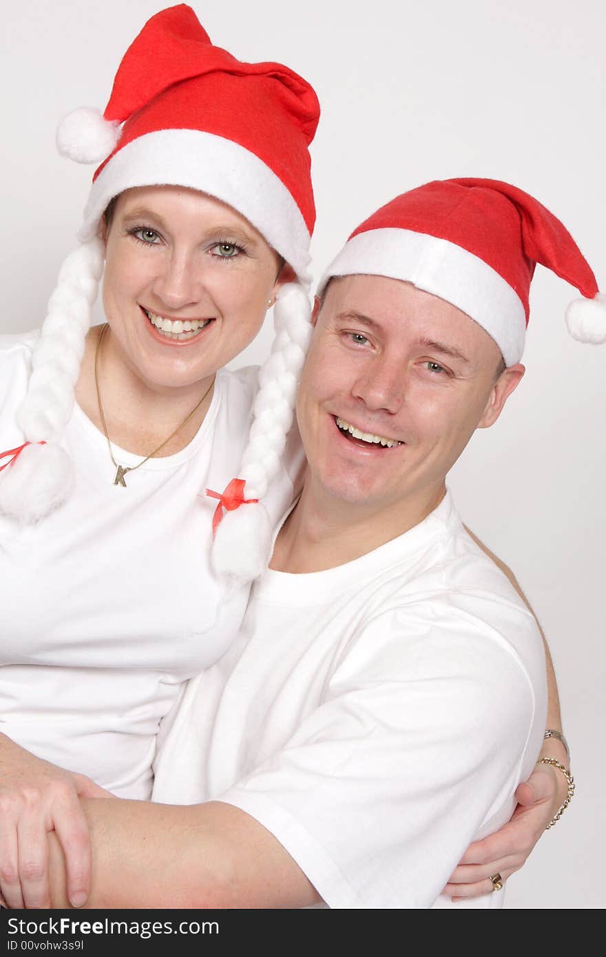 A man and woman celebrating Christmas. A man and woman celebrating Christmas