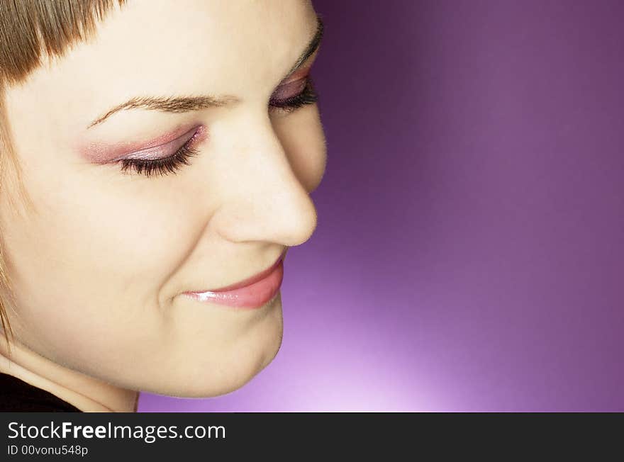 Beauty woman with closed eyes on purple background. Beauty woman with closed eyes on purple background