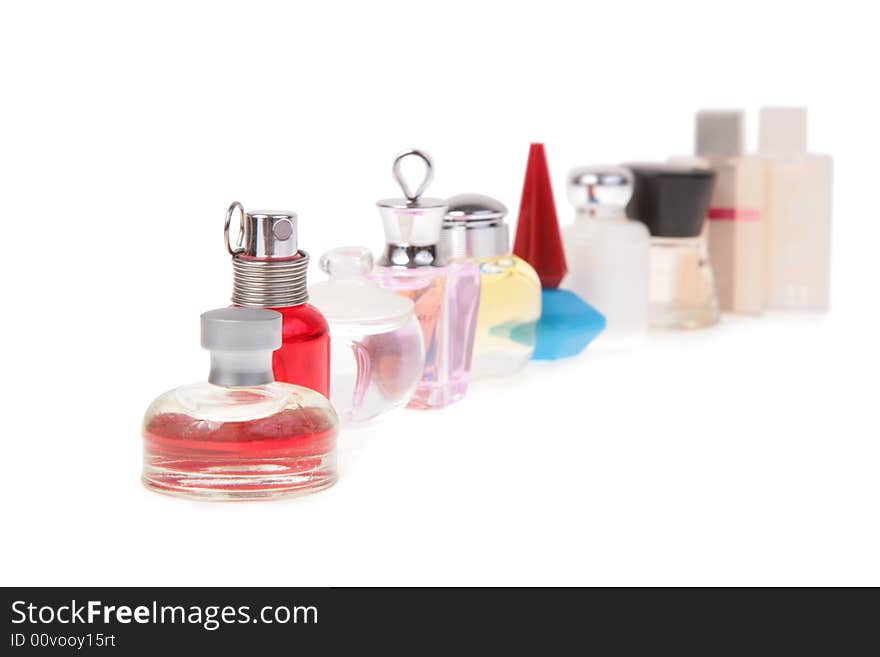 Row of flasks with perfume