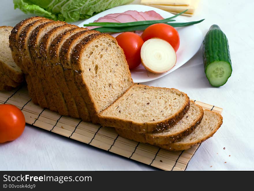 Bread and vegetables. Close up.