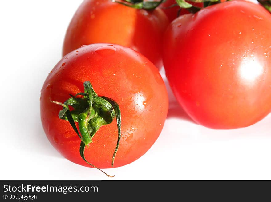 Fresh red tomatoes isolated on white background. Fresh red tomatoes isolated on white background