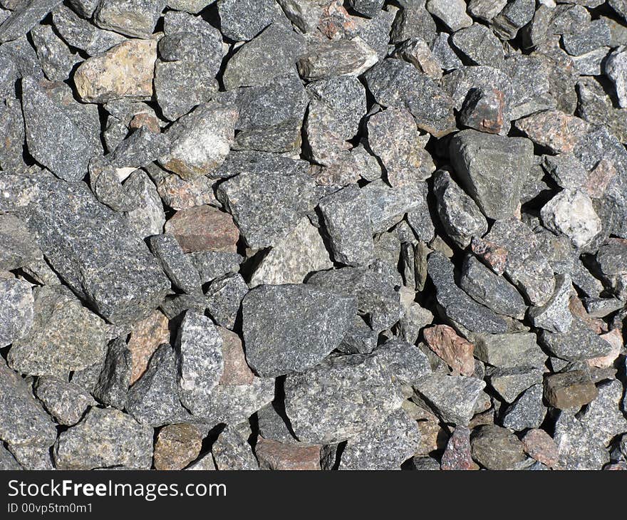 Large gravel background texture on railway embankment