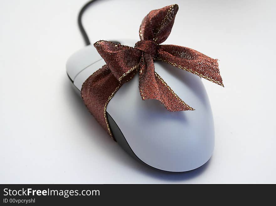 Computer mouse with brown bow. Computer mouse with brown bow