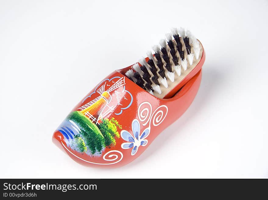 Shoe shine brush over white background