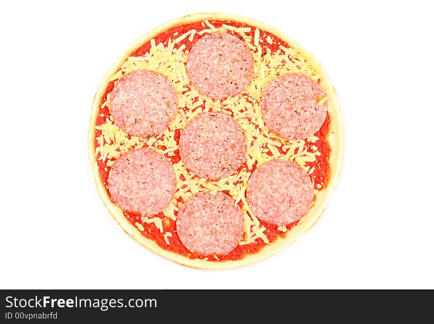 Uncooked, frozen pizza isolated on a white background.