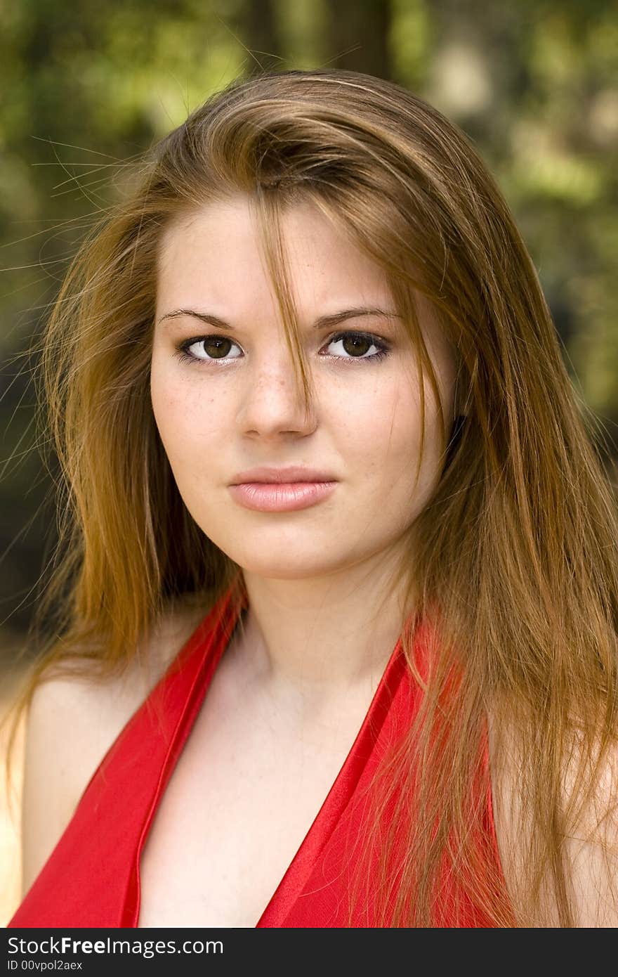 Sultry brunette with formal red dress. Sultry brunette with formal red dress