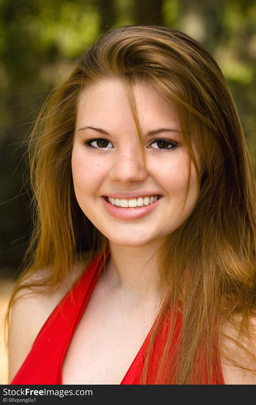 Beautiful, sultry woman in red formal dress. Beautiful, sultry woman in red formal dress