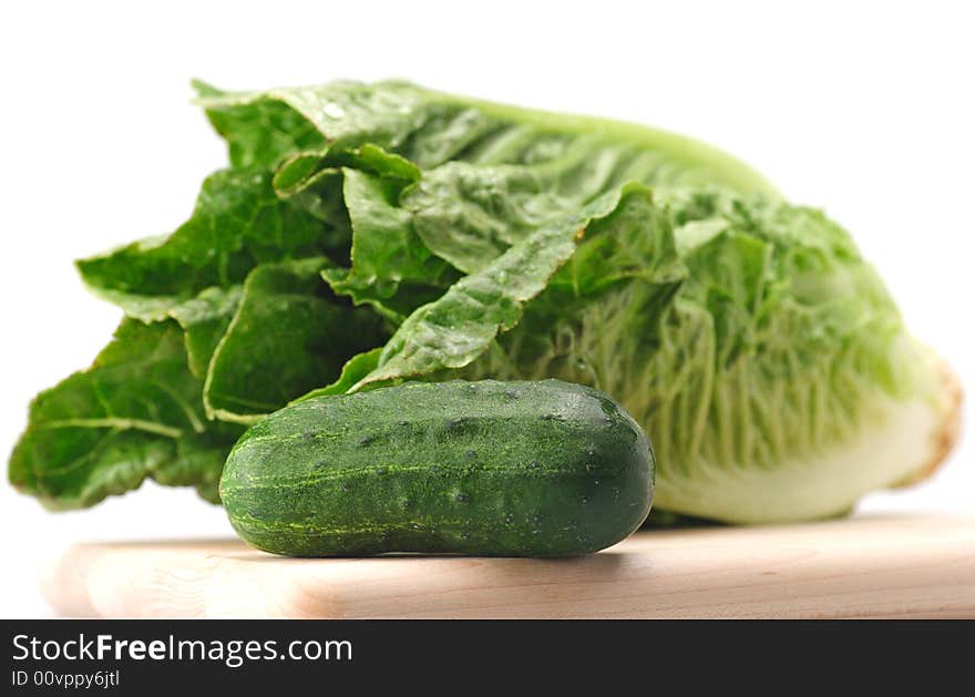 Fresh green romaine lettuce and cucumber for salad