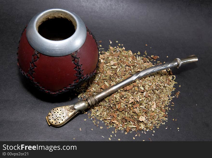 Сup from calabash with yerba mate tea and straw. Сup from calabash with yerba mate tea and straw.