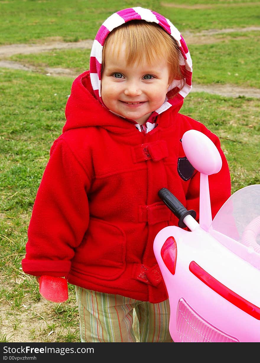 Girl And Her Tricycle