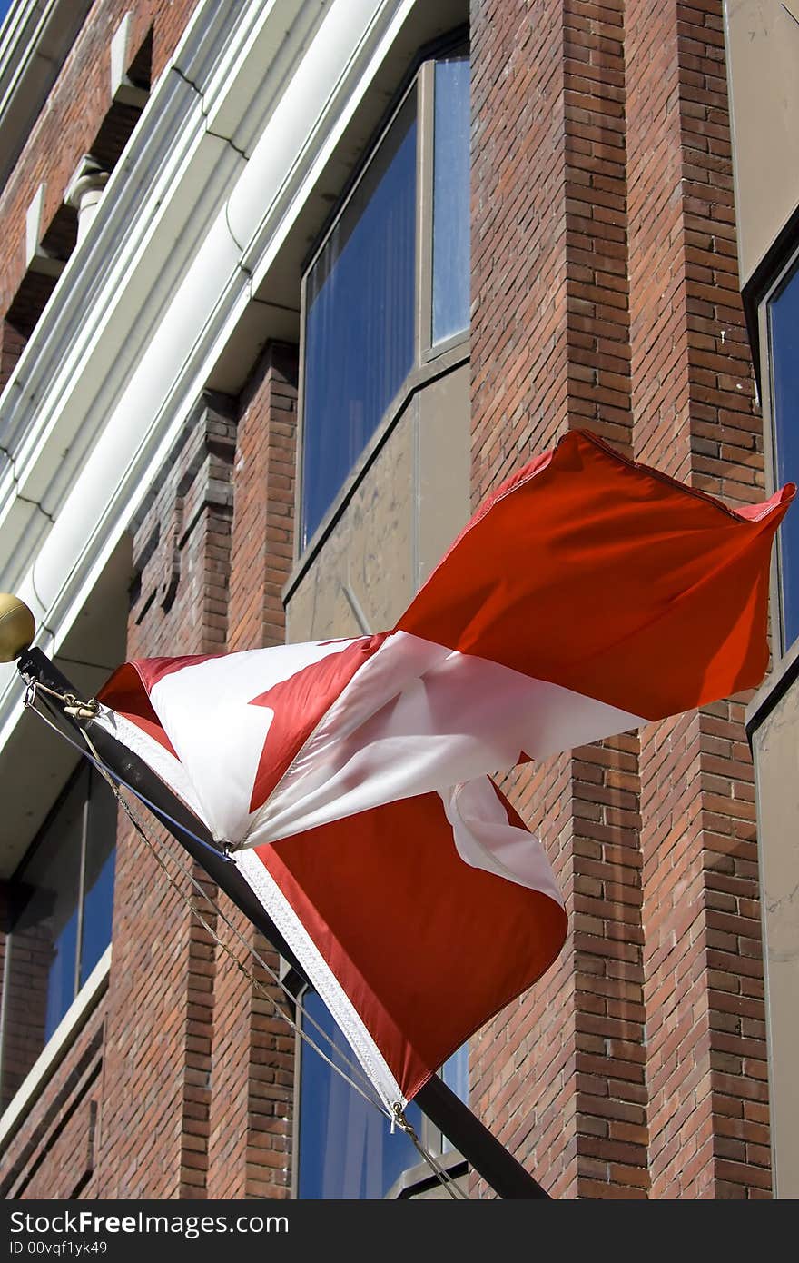 Canadian flag in front of administrative building