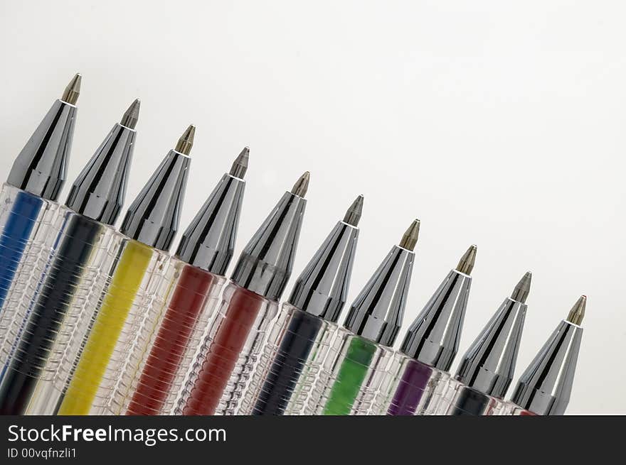 Coloured pens on white background. Coloured pens on white background.