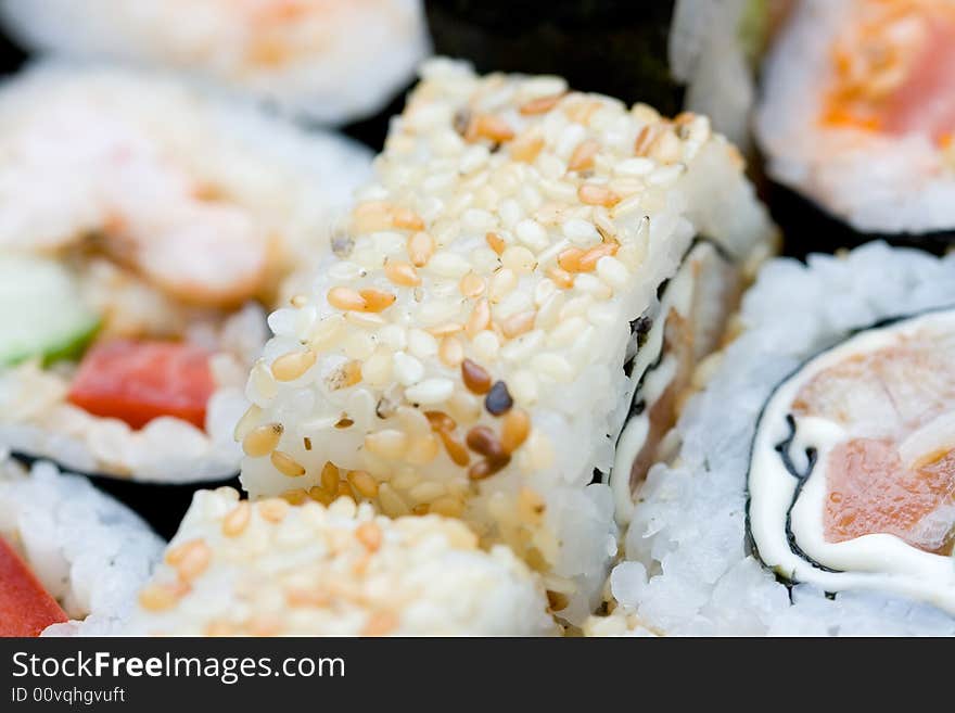 Different types of traditional japanese rolls close-up. Different types of traditional japanese rolls close-up