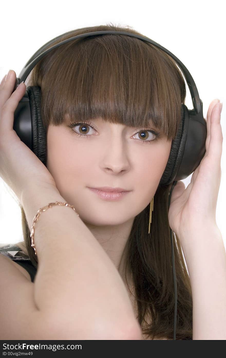 Cute brunette with earphones