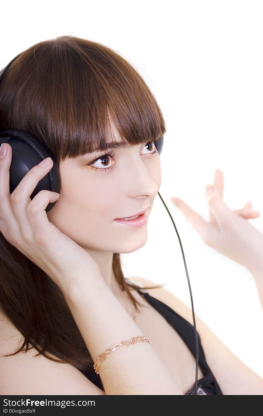 Cute brunette with earphones