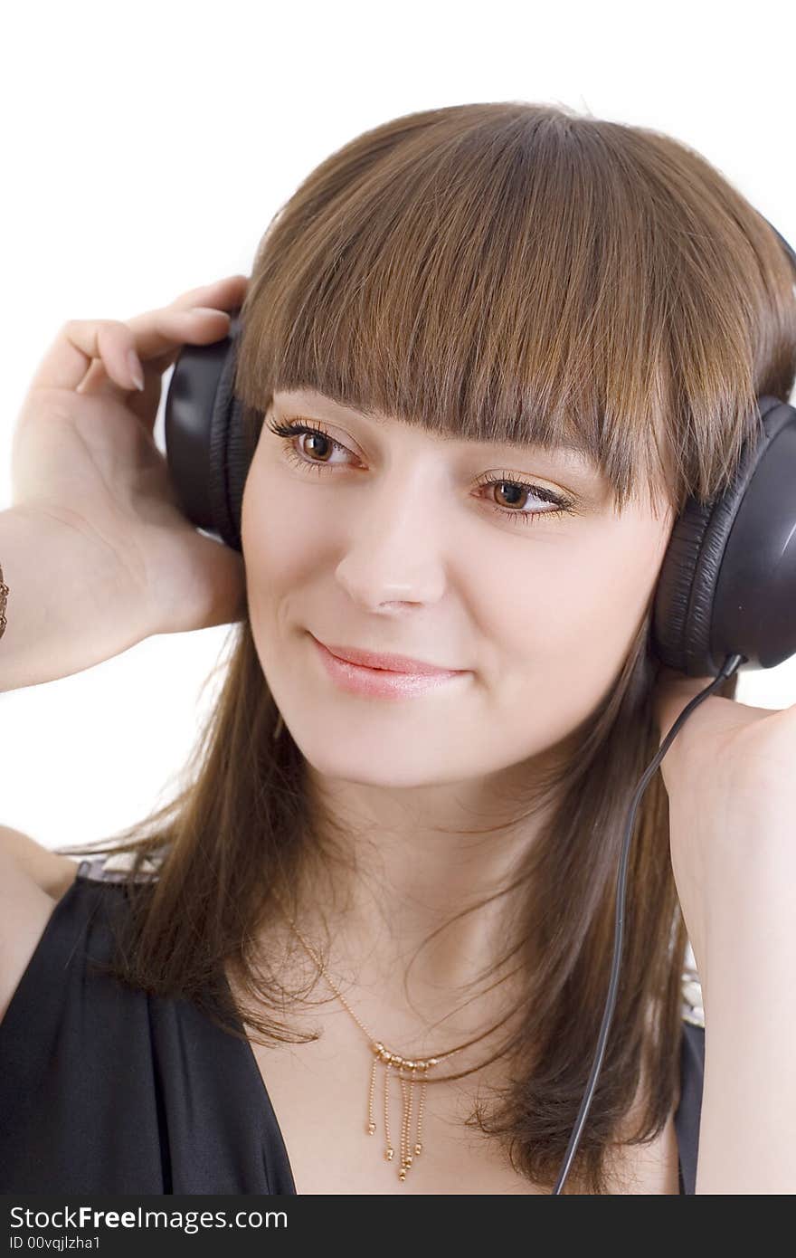 Cute brunette with earphones