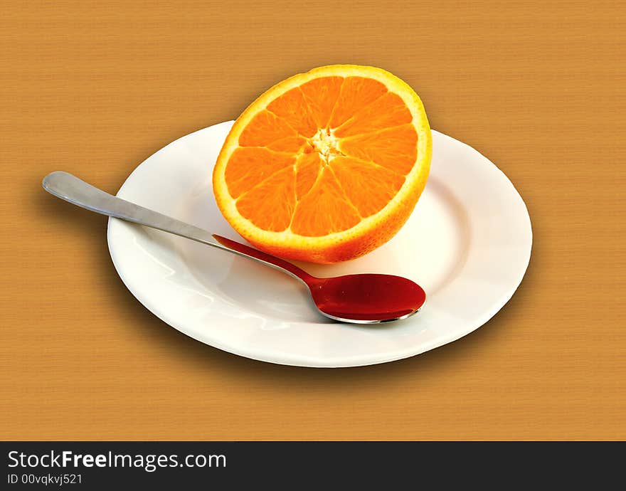 Half of an orange on plate with metal spoon lying beside it. Half of an orange on plate with metal spoon lying beside it.