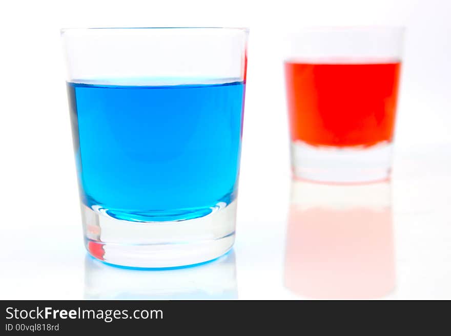 Glasses of soft drink isolated against a white background. Glasses of soft drink isolated against a white background