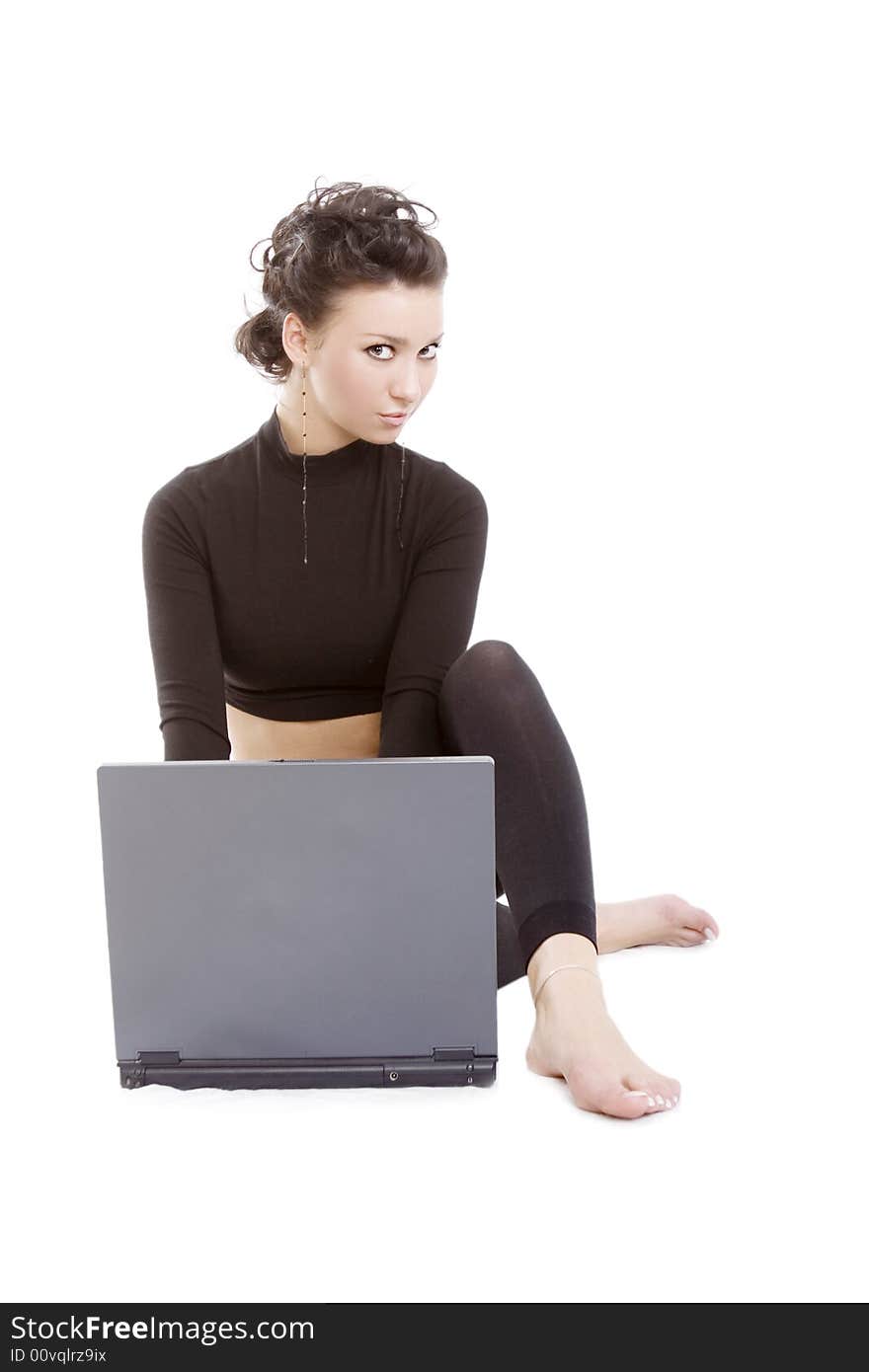 Sexy woman with a laptop isolated on white. Sexy woman with a laptop isolated on white