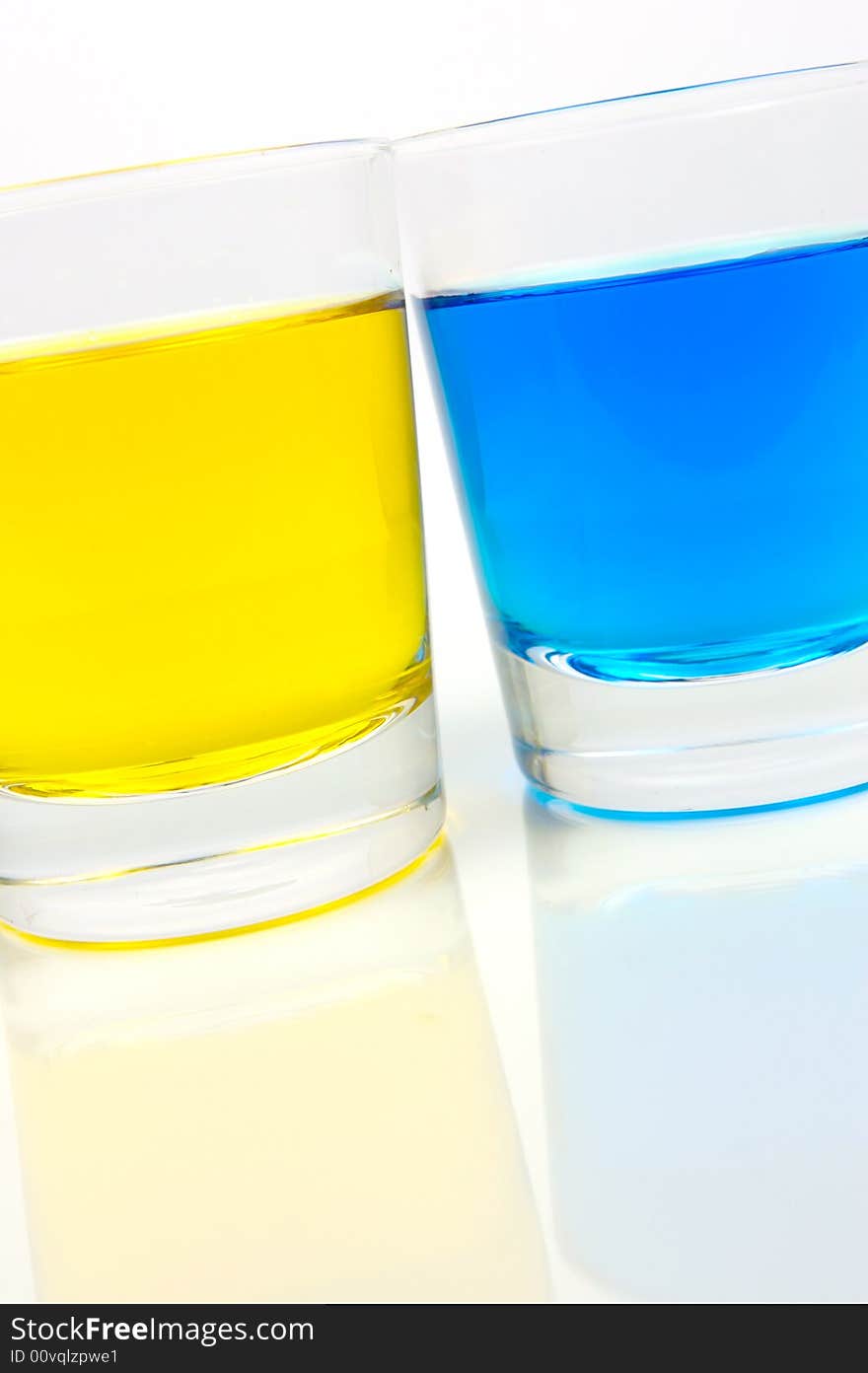 Glasses of soft drink isolated against a white background. Glasses of soft drink isolated against a white background