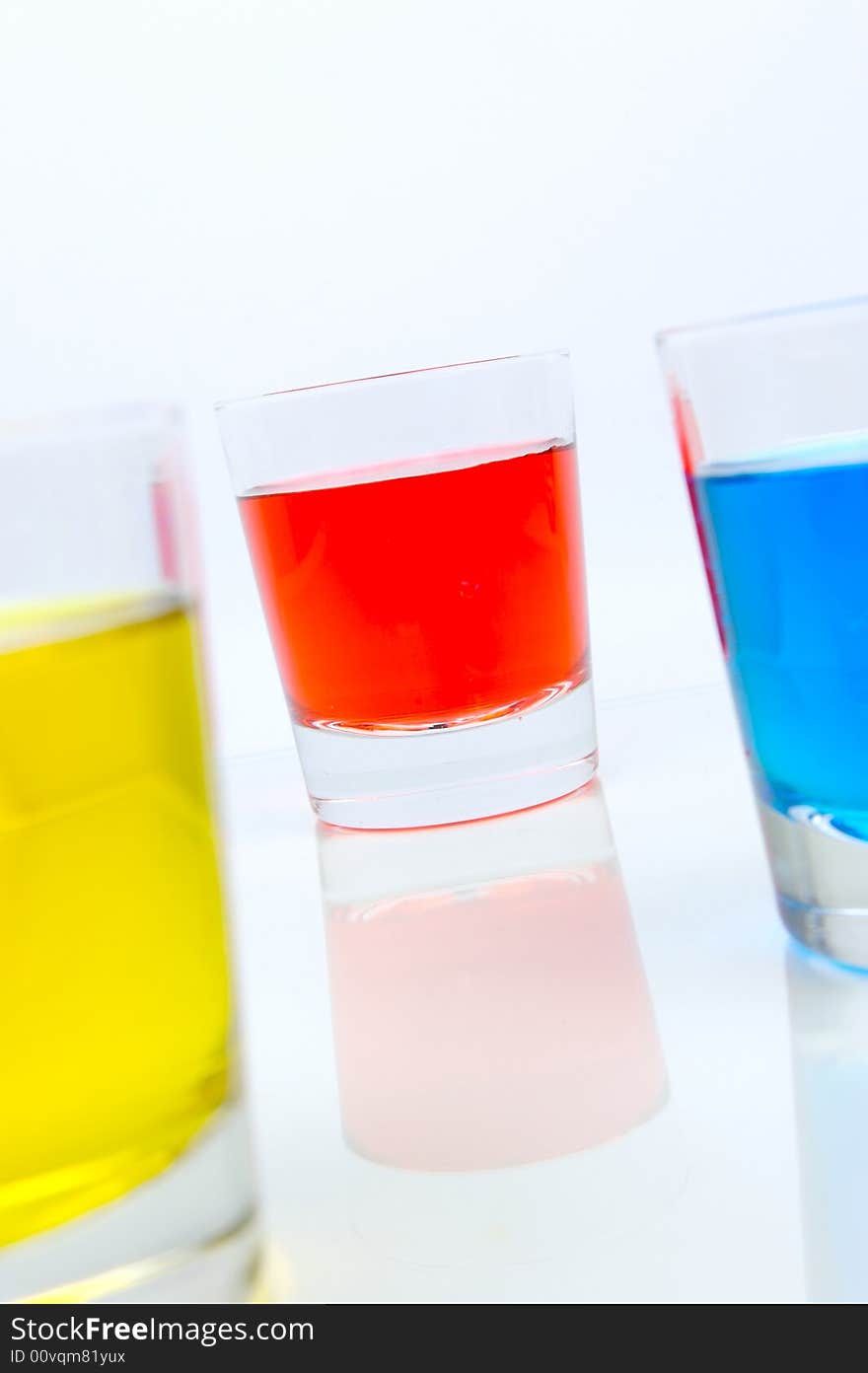 Glasses of soft drink isolated against a white background. Glasses of soft drink isolated against a white background