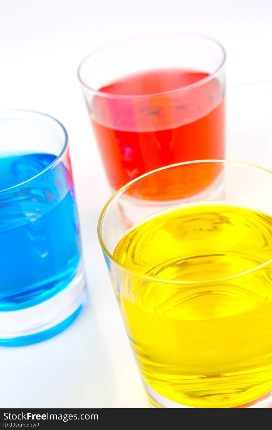 Glasses of soft drink isolated against a white background. Glasses of soft drink isolated against a white background