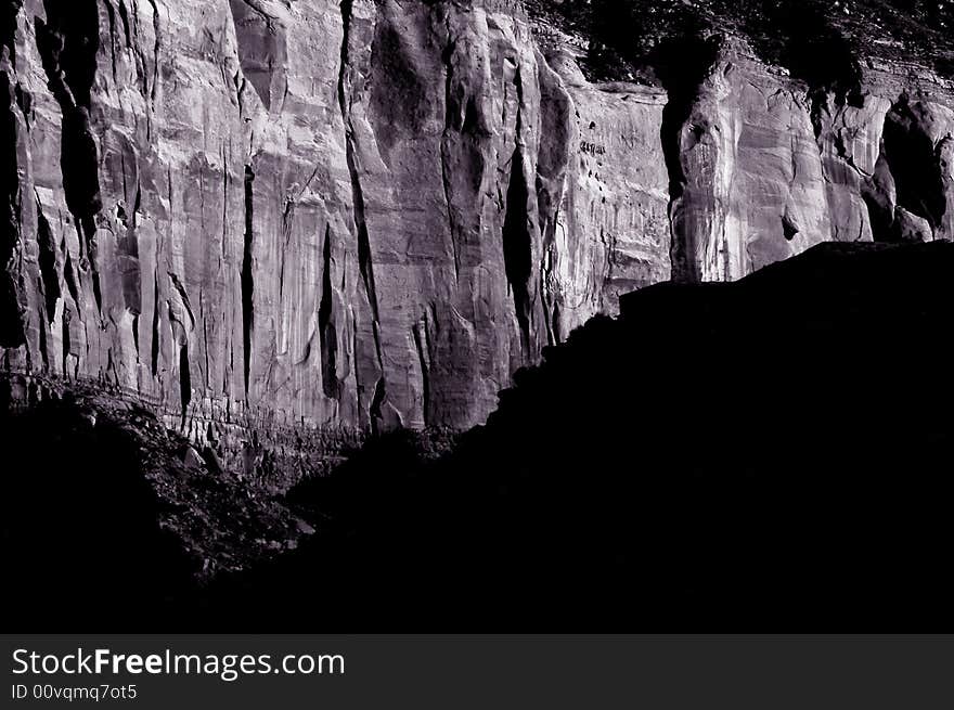 Interesting Black and White Image of a rockface In Monument valley. Interesting Black and White Image of a rockface In Monument valley