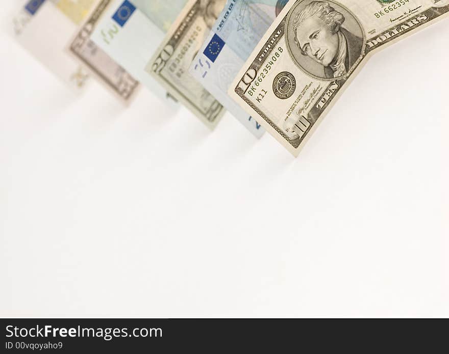 Isolated cash banknotes of dollars and euros