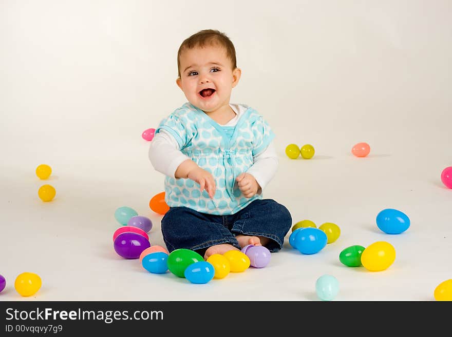 Cute baby girl with easter plastic eggs. Cute baby girl with easter plastic eggs