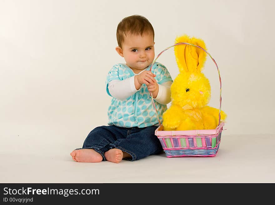 Baby with an easter basket and Eater Bunny - and may not want to share. Baby with an easter basket and Eater Bunny - and may not want to share
