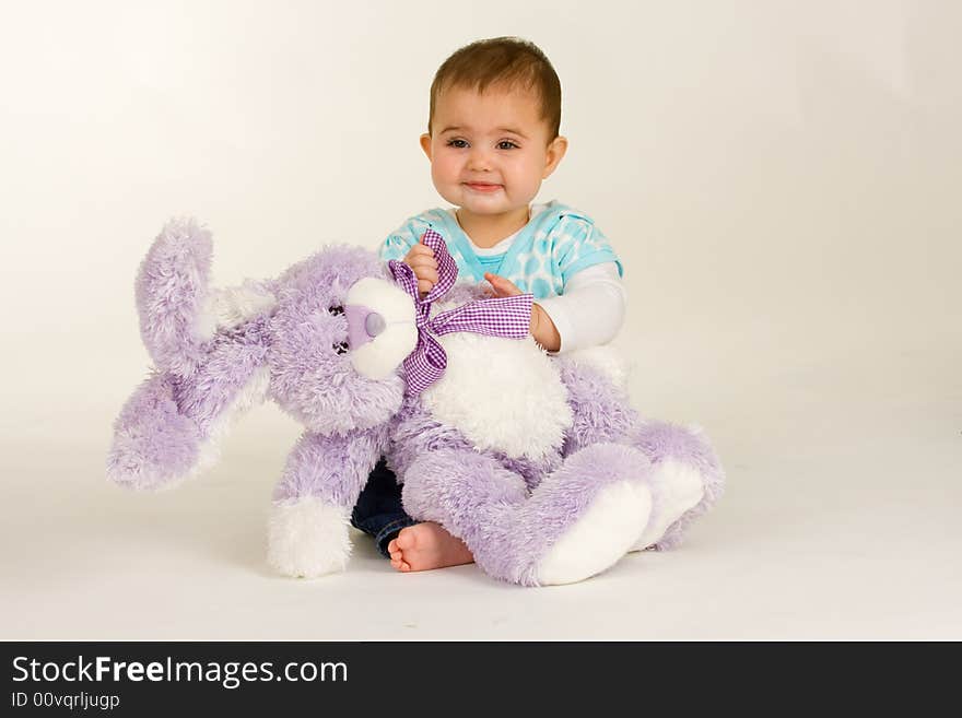 Baby with an Easter Bunny - and is very happy. Baby with an Easter Bunny - and is very happy