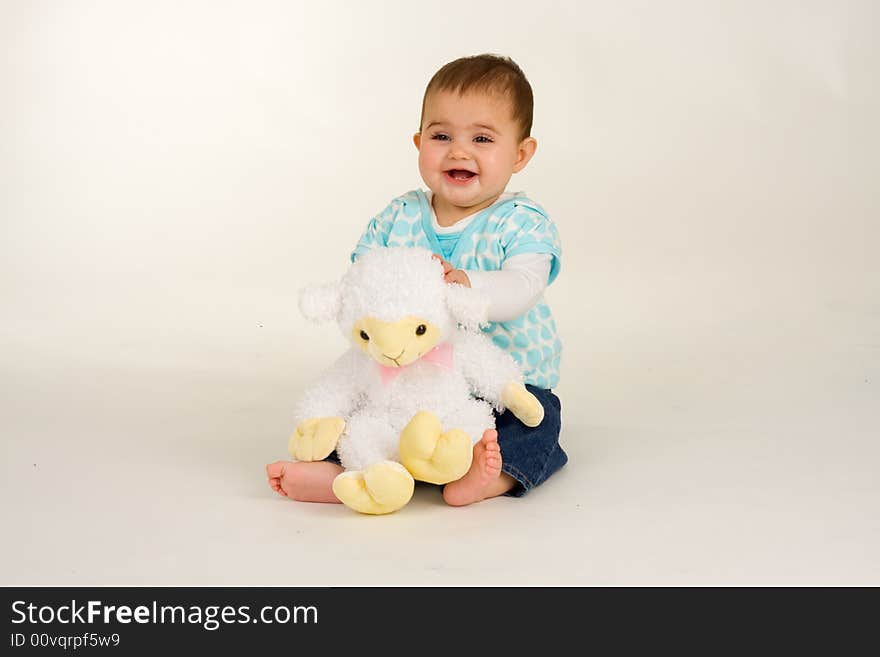 Baby with an Easter lamb - and is very happy. Baby with an Easter lamb - and is very happy