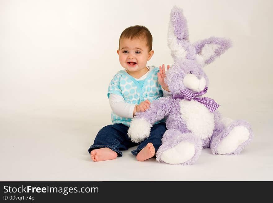 Baby with an Easter Bunny - and is very happy