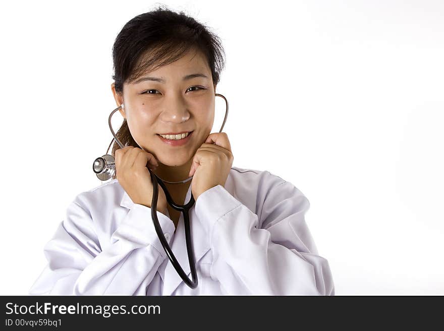 Female doctor with stethoscope in white background. Female doctor with stethoscope in white background.