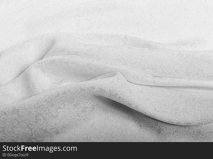 Folds of a grey fabric, a horizontal format. Folds of a grey fabric, a horizontal format