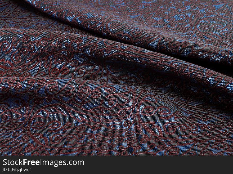 Brocade in dark it is red violet tones. Brocade in dark it is red violet tones