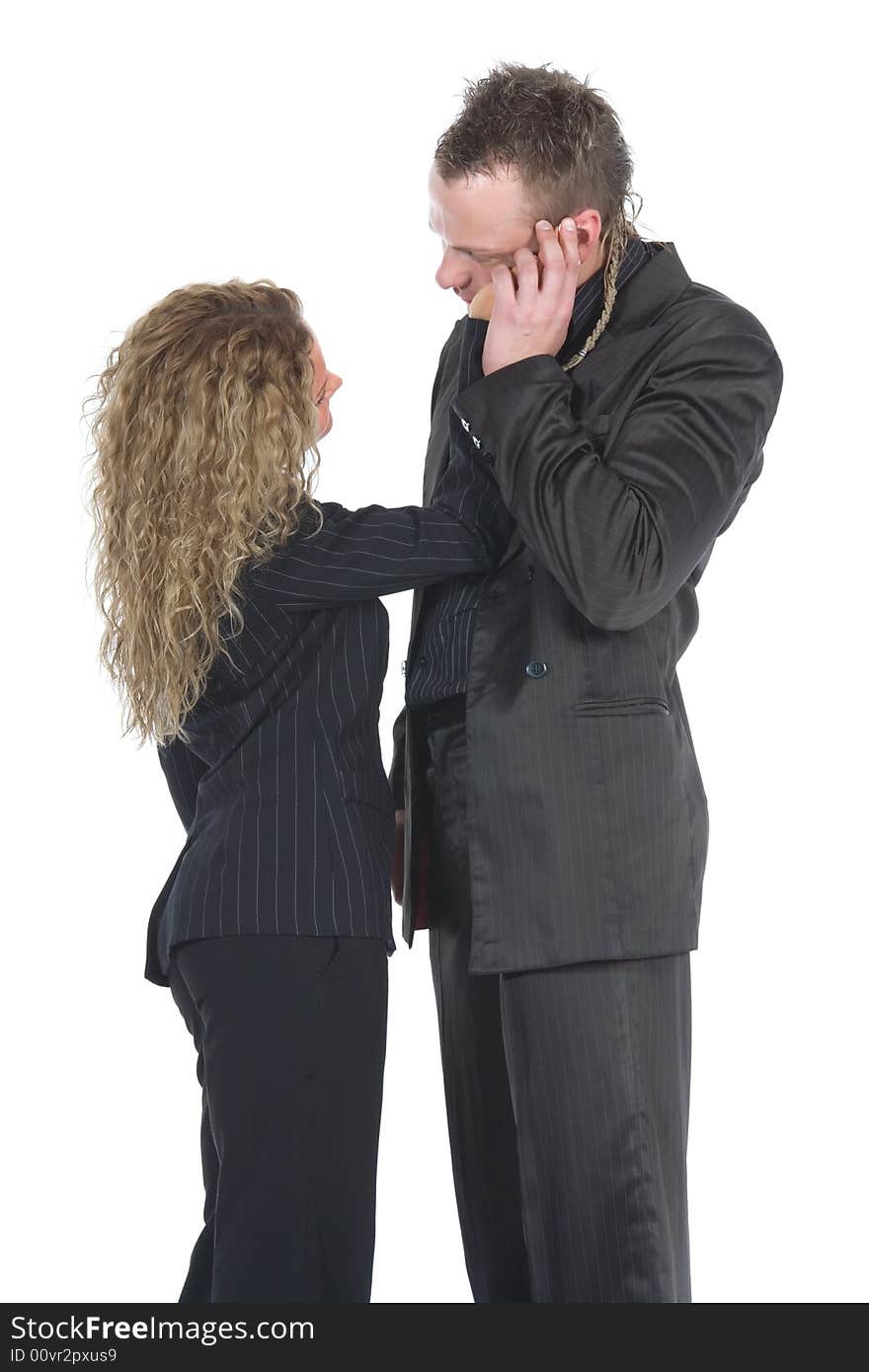 Young couple in black dress on white background