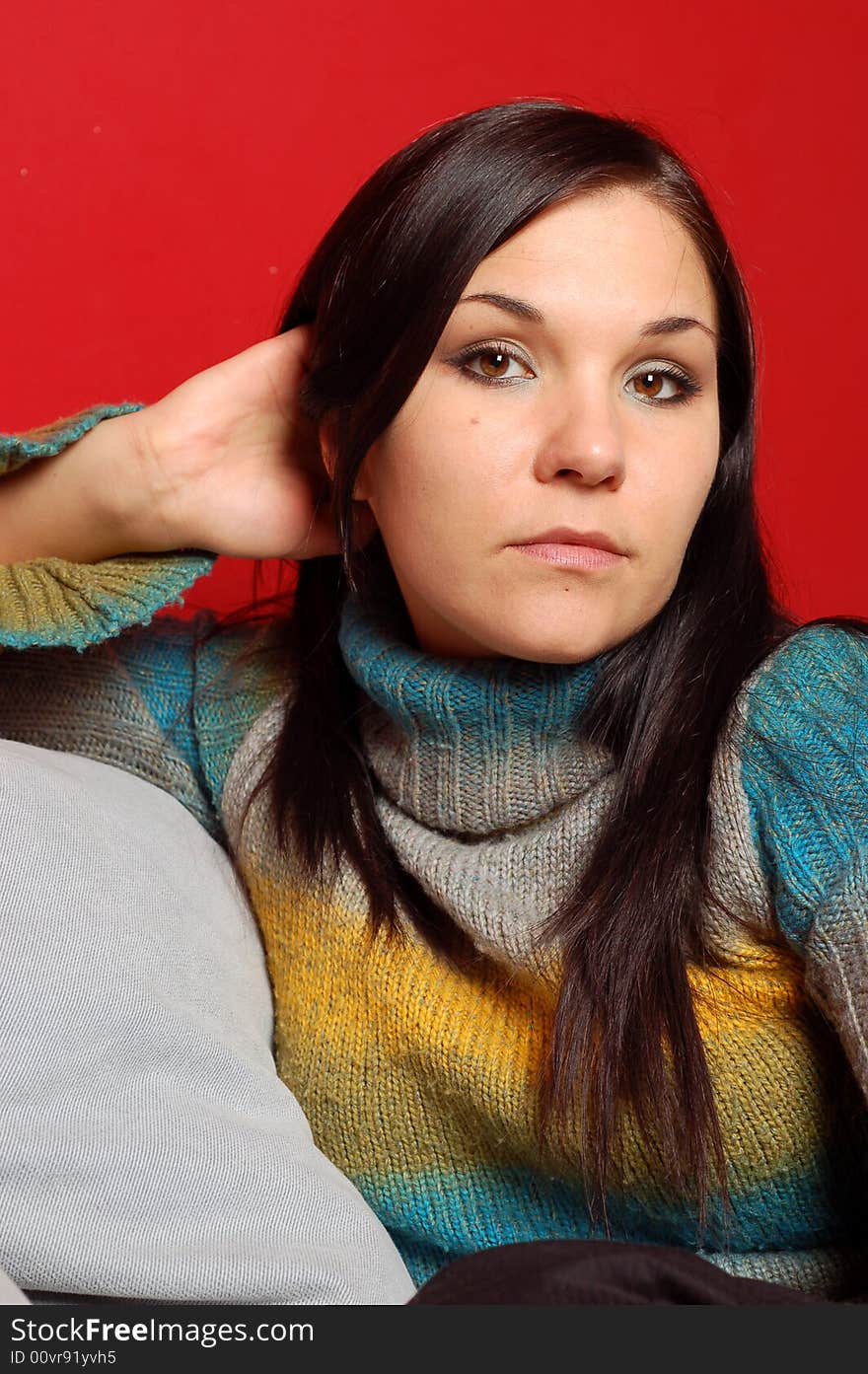 Woman Relaxing On Sofa