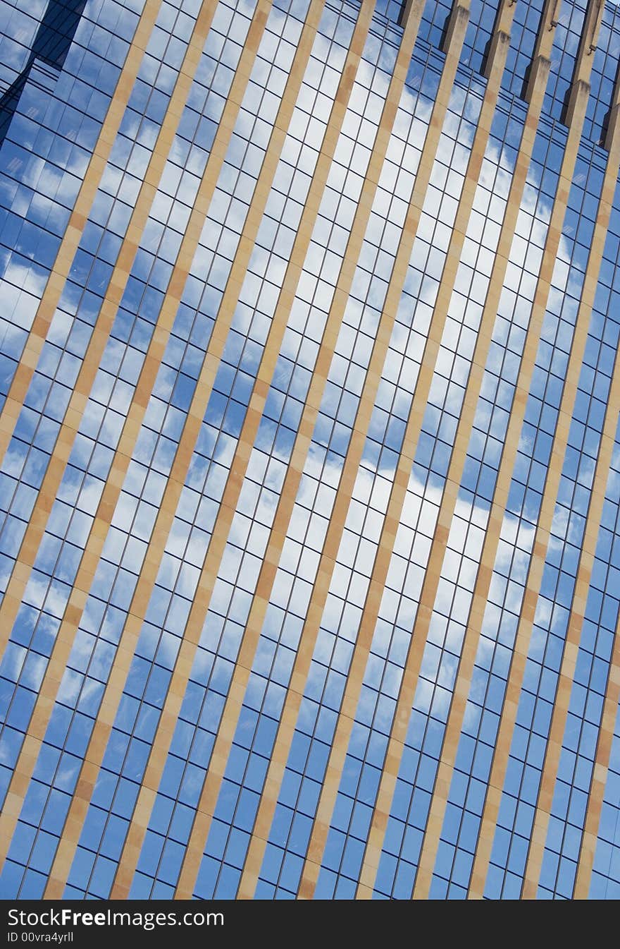 Clouds reflected into building