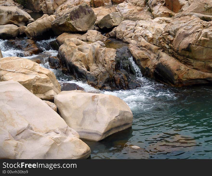 Water flow from strange stone. Water flow from strange stone