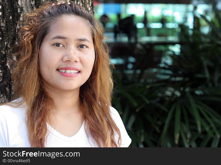 Close-up portrait of a young Thai woman. Close-up portrait of a young Thai woman.