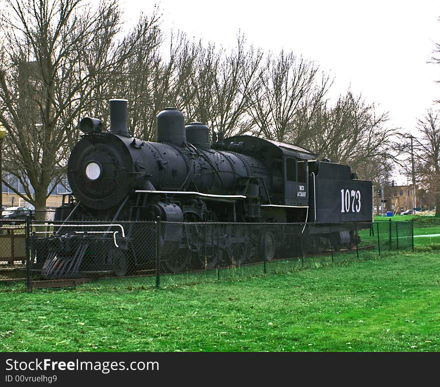 This is side view of the AT&SF stean engine 1073 a 2-6-2. This is side view of the AT&SF stean engine 1073 a 2-6-2.