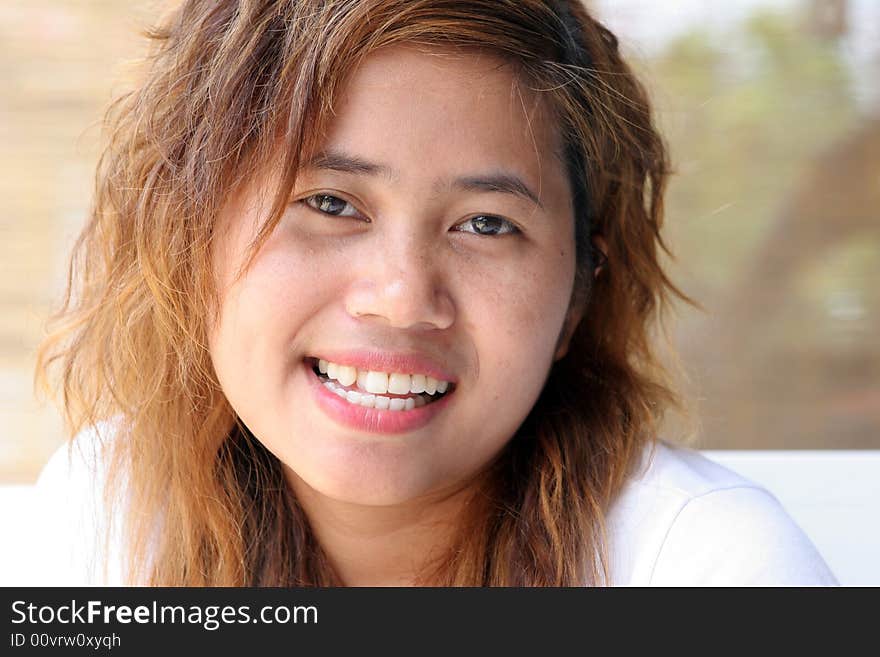 Close-up portrait of a pretty Thai woman. Close-up portrait of a pretty Thai woman.