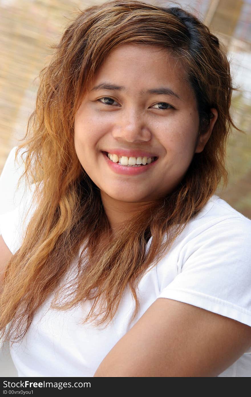 Close-up portrait of a pretty Thai woman. Close-up portrait of a pretty Thai woman.