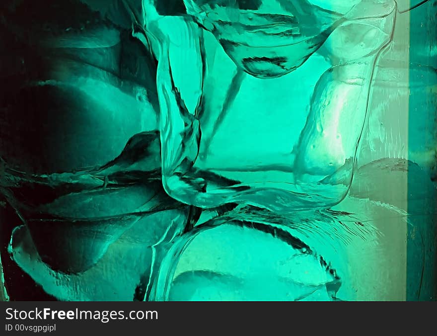 Water drops on glass with ice for background