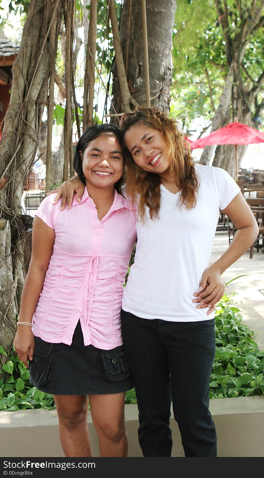 Portrait of two happy Asian woman. Portrait of two happy Asian woman.