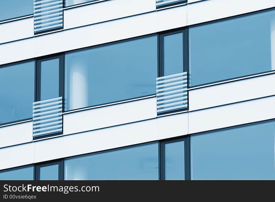 Bluewindows on building wall with flat perspective. Bluewindows on building wall with flat perspective.