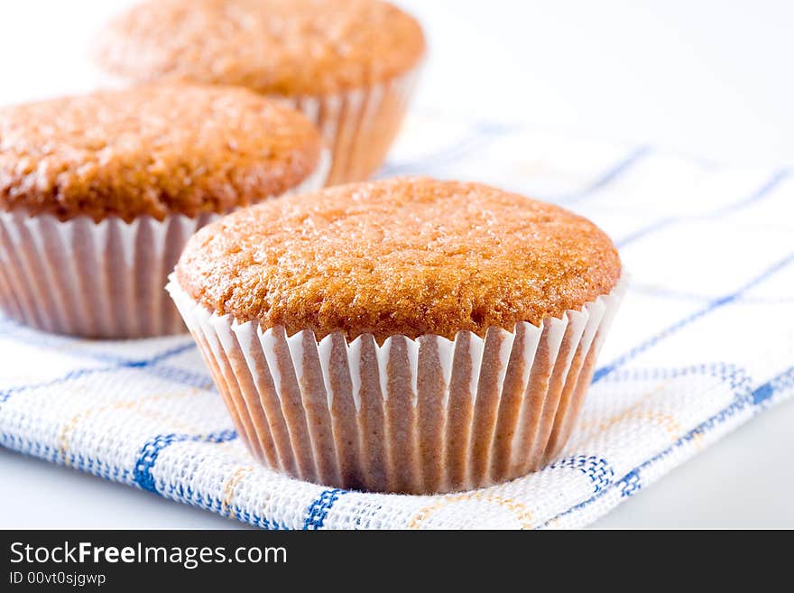 Three tasty muffins, isolated